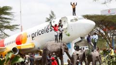 Flights halted at Kenyan airport as thousands turn out to receive Odinga's body