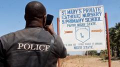Nigerian villagers 'too scared to speak' after hundreds of schoolchildren kidnapped