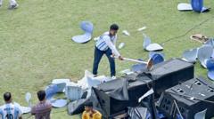 Angry fans throw chairs and bottles at Messi event in India