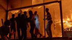 Bangladesh newspaper staff recall 'gasping for air' as offices set ablaze