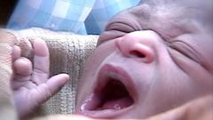'Miracle baby' born in a tree above Mozambique floodwaters dies aged 25