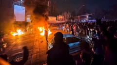 Iran protesters defy crackdown as videos show violent clashes