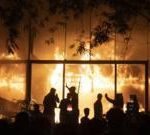 'I can't breathe any more': Inside the night a mob burned a newspaper