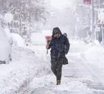 More than 5,000 flights cancelled as US east coast digs out of record snow