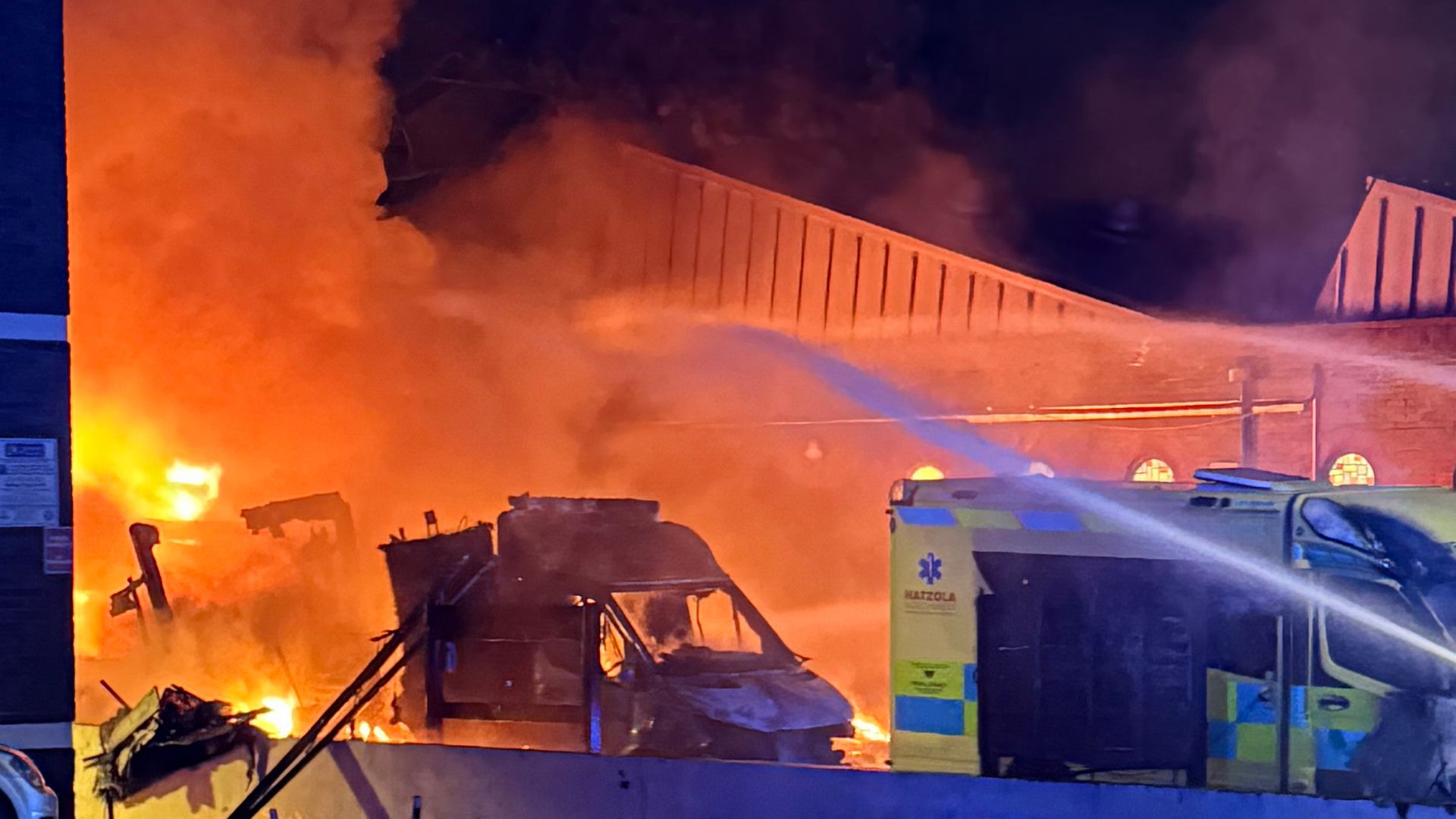 Two men arrested by counter terror police after arson attack on ambulances