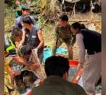 Four more men freed from flooded Laos cave after 10 days