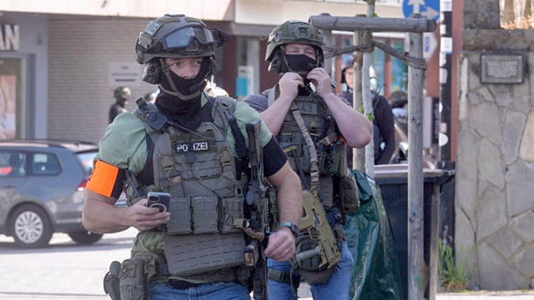 Hostages taken as police and special forces surround German bank