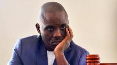 Lawyer in high-profile Ugandan treason case charged with related offence