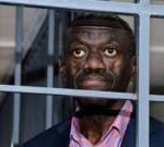 Veteran Ugandan opposition leader collapses in court and in ICU, his wife says