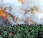 Wildfire raging south of Paris could have been set deliberately, says minister