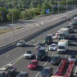 Driver arrested after highways worker hit by van near Gatwick Airport