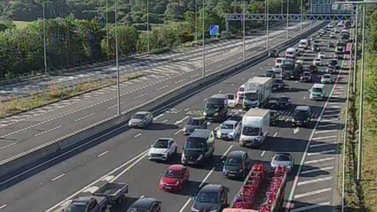 Driver arrested after highways worker hit by van near Gatwick Airport