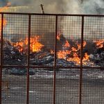 Loyalist bonfire with mosque replica on top is set alight before bid to remove display