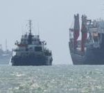 China warns it will safeguard its interests after US widens sanctions against Iran
