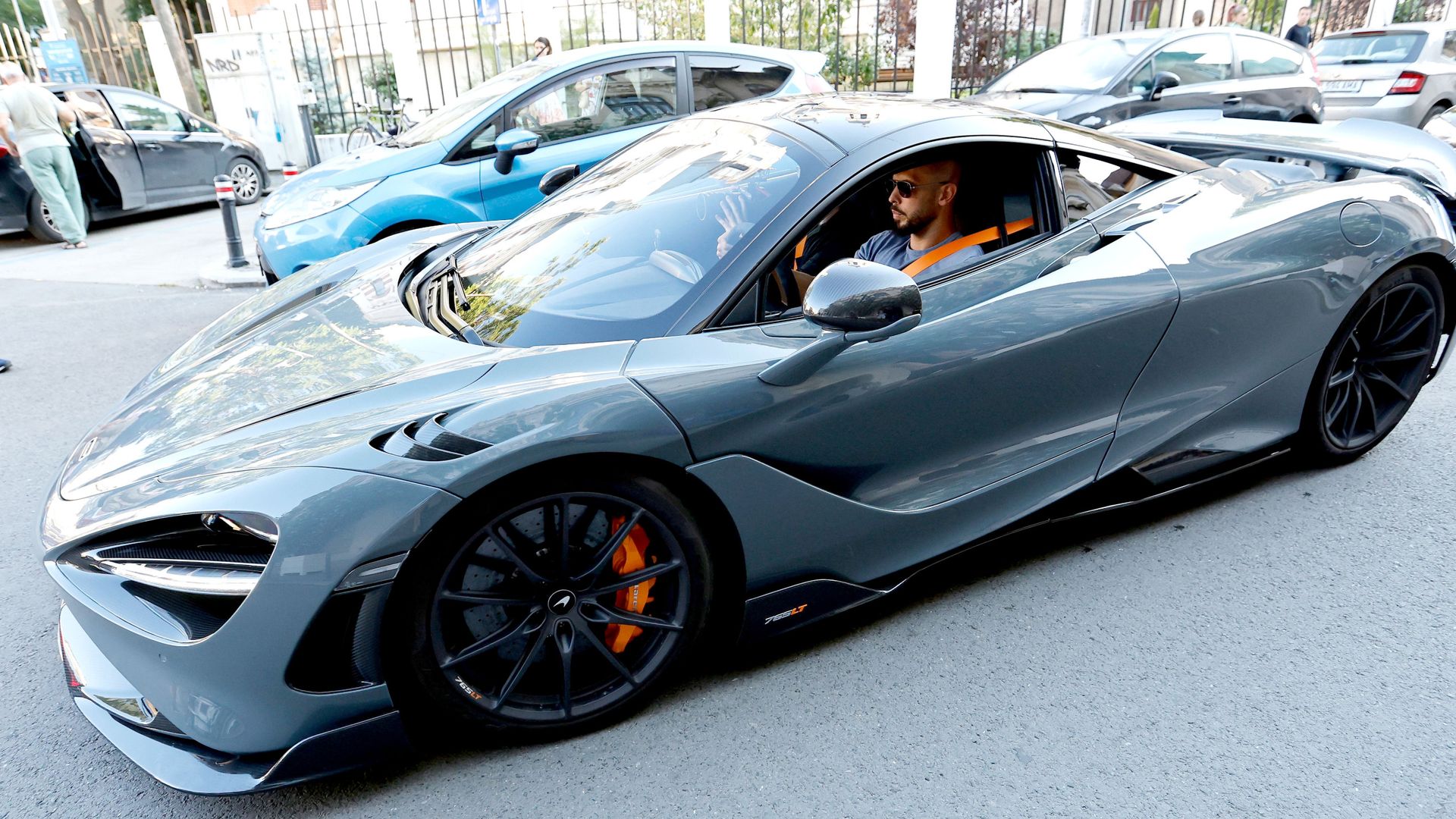 Andrew Tate rented supercars to appear 'uberwealthy', lawyers say
