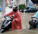 Bangkok roads submerged as flood disaster declared