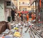 Rescuers dig through debris as seven dead in building collapse in Delhi