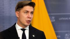 Lithuania ready to 'fight back' but has evacuation plans in face of Russia threats, PM tells BBC