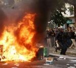 France halts use of stun grenades after boy's hand blown off in student protests