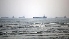 Tanker hit by multiple projectiles in Gulf off Qatar, maritime agency says