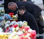 Kyiv bridge hit in further Russian drone attack as German chancellor makes surprise visit